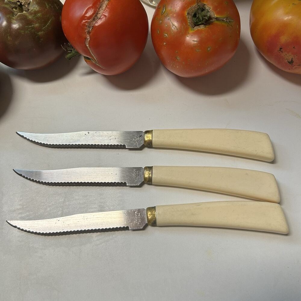 Vintage Quikut Quikkle serrated steak knives cream color handles Set Of 3 Used